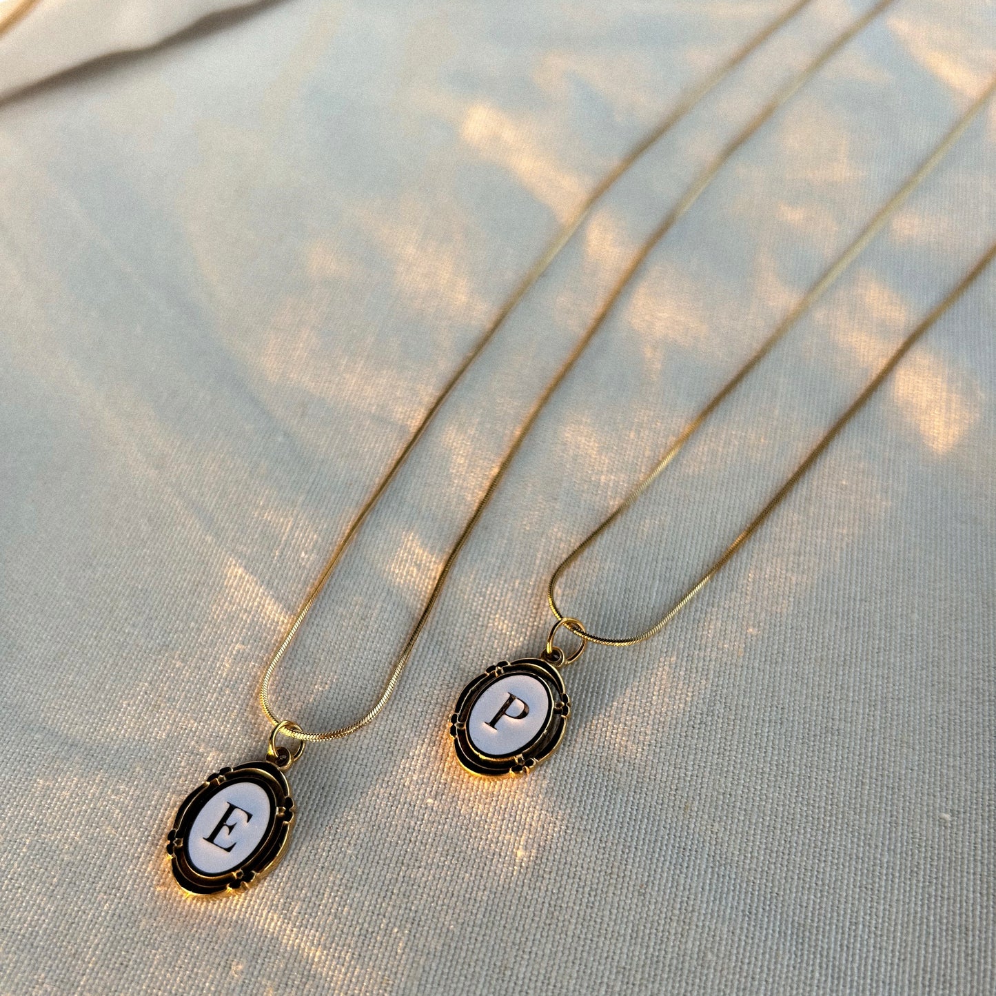 Initial necklaces